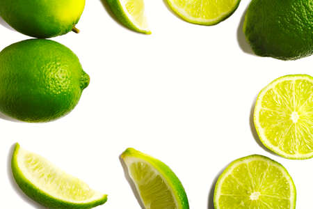 Fresh limes isolated on white background