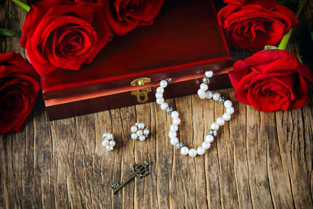 Fresh red roses with pearls の写真素材