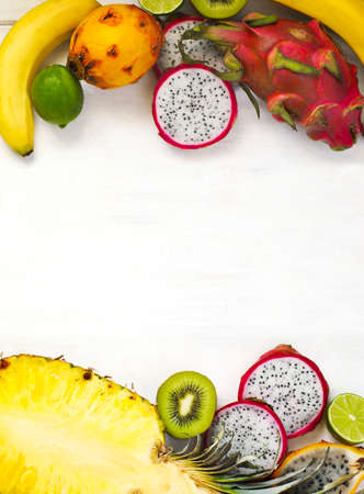 Autumn fruits in basket on wooden background witn copy spaceの写真素材