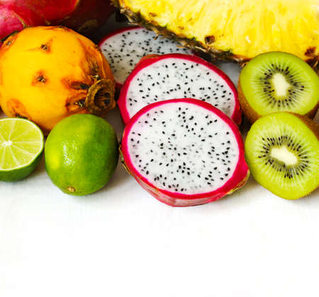 Assortment of exotic fruits on white background with copy spaceの写真素材