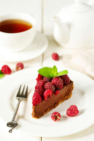 Chocolate cake with fresh raspberry.の写真素材