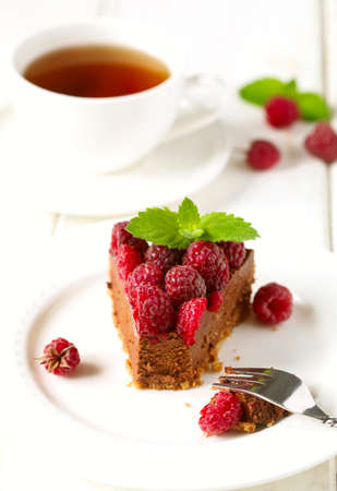 Chocolate cake with fresh raspberry.の写真素材
