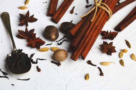 Mixture of dried spies for indian masala chai or spicy tea: anise, cardamom, cinnamon, nutmeg, clove...