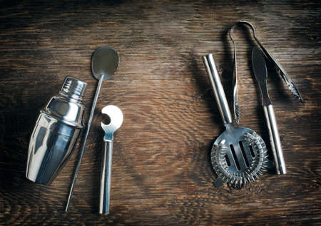Set of bar accessories on wooden background with copy spaceの写真素材