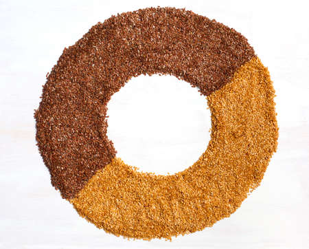 Brown and goden flax seeds.の写真素材
