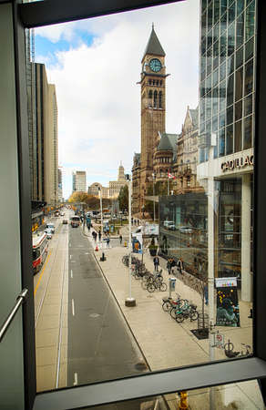 TORONTO, ONTARIO, CANADA - NOVEMBER 22, 2017: View of Old City Hall with tower clock from Pedestrian bridge in Toronto Downtown at November 22, 2017, Ontario, Canadaのeditorial素材