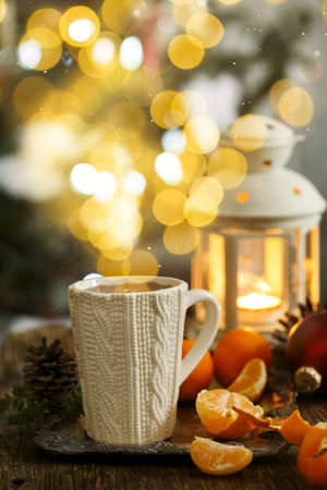 Mug with hot tea, Christmas backgroundの写真素材