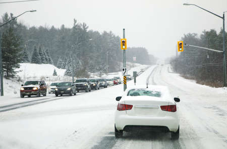 Snow in the city. Driving in severe weather conditionsの写真素材