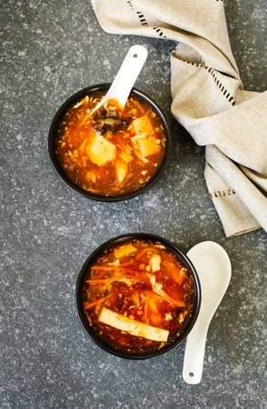 Hot and Sour Soup in bowl, top viewの写真素材