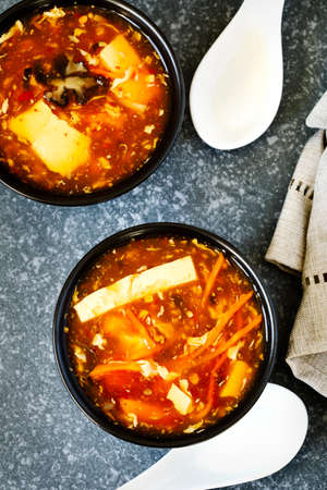Hot and Sour Soup in bowl, top viewの写真素材