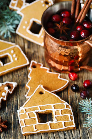 Gingerbreads and Winter hot tea with cranberry and spices. の写真素材
