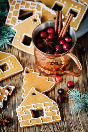 Gingerbreads and Winter hot tea with cranberry and spices.の写真素材