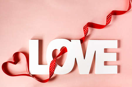 Word Love on pink backgroundの写真素材