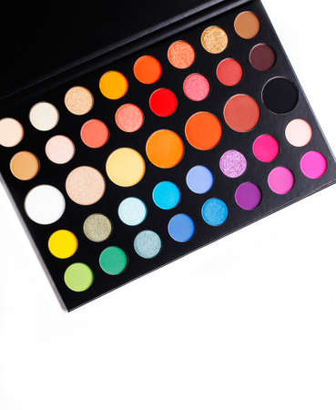 Colorful make up eye shadow on white background, top view, copy spaceの写真素材