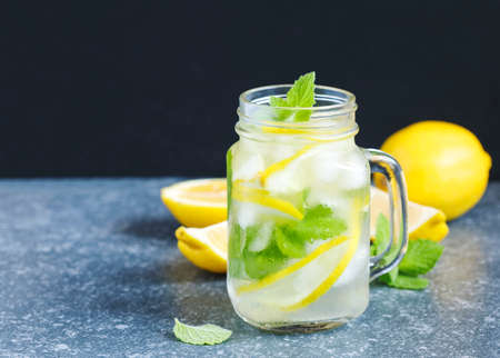 Mason jar glass of lemonade with mint, copy spaceの写真素材