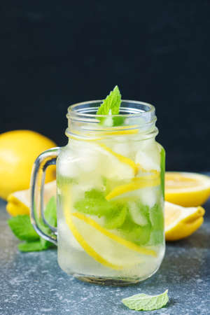 Mason jar glass of lemonade with mintの写真素材