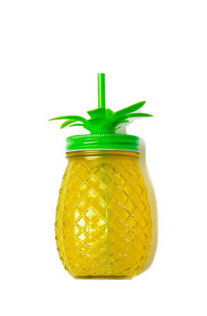 Pineapple juice in bottle isolated on white backgroundの写真素材