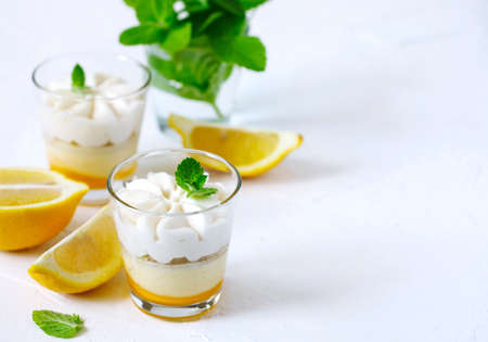 Limoncello - italian Dessert.  Lemon Cheesecake Mousse with Whipped Cream in cups. Summer dessert.の写真素材