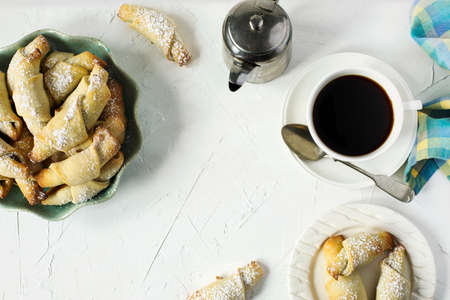 Rugelach with chocolate filling and cup of coffe, top viewの写真素材