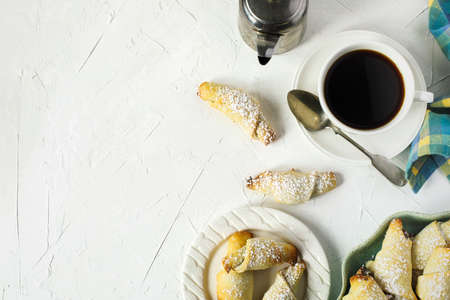 Rugelach with chocolate filling and cup of coffe, top viewの写真素材