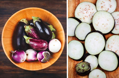 Fresh eggplants of different color and variety in wooden bowl on a wooden background, top viewの写真素材