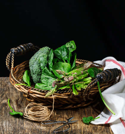 Fresh green vegetables on wooden table with copy spaceの写真素材