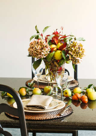 Autumn table decoration. Thanksgiving table setting with autumn decorationsの写真素材