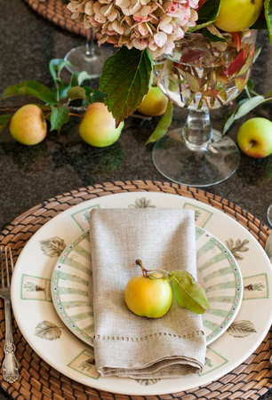 Autumn table decoration. Thanksgiving table setting with autumn decorationsの写真素材