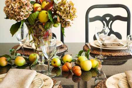 Autumn table decoration. Thanksgiving table setting with autumn decorationsの写真素材