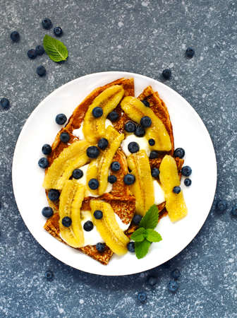 Crepes with caramelised banana, top viewの写真素材