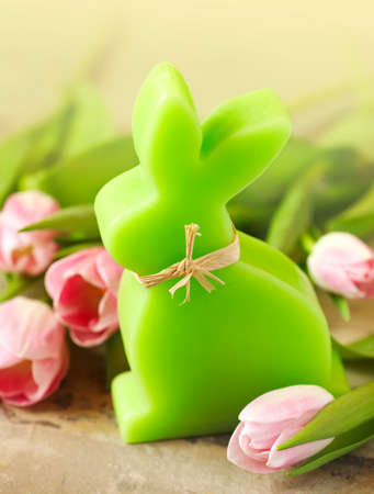 Easter card with pink tulips and bunny decoration, copy spaceの写真素材
