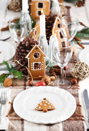 Christmas table setting with gingerbread. Holiday decorationの写真素材