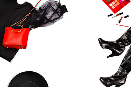 Women's set of fashion accessories in black and red color on white background: shoes, pullover, hat, handbag and cosmetics. Top view. Fashion conceptの写真素材