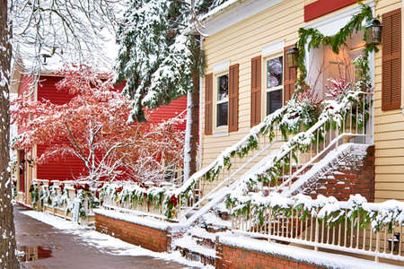 Beautiful house covered snow located in the Queen Street, Niagara on the Lake, Ontario, Canadaの写真素材
