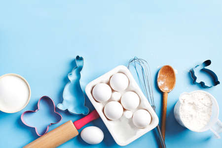 Baking background frame. Preparation for Easter baking. Ingredients and kitchen items for baking....