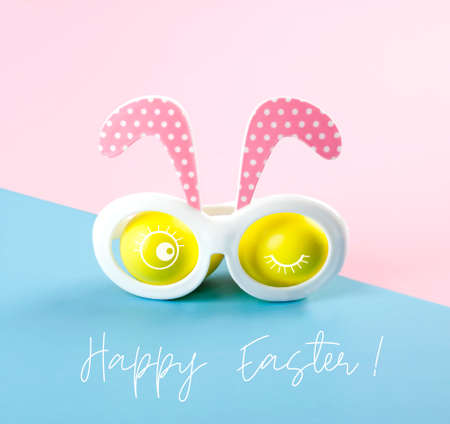 Easter banner with Easter bunny. Easter bunny glasses. Easter concept. Copy spaceの写真素材
