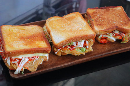 vegetable cheese sandwich on wooden board