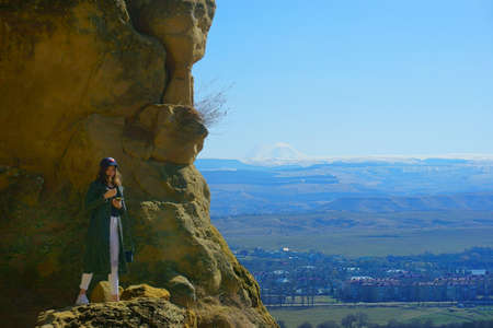 Beautiful woman in the mountainsの写真素材