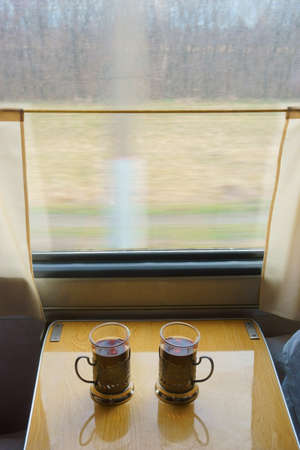 Two glasses of tea on the train, railway
