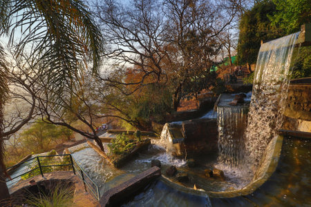 Waterfall in the botanical garden of the Royal Palace of Madrid, Spainの写真素材