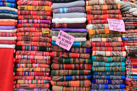 Colorful handkerchiefs on a market stall in Peru.の写真素材