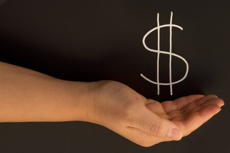 money on blackboardの写真素材