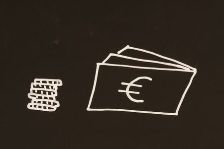money on blackboardの写真素材