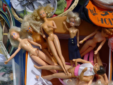 barbies on sale on a street marketの写真素材