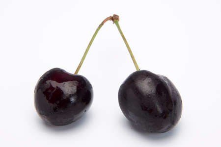 Delicious fresh cherry isolated on white backgroundの写真素材