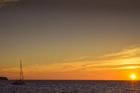 beautiful sunset at horizon at Santorini island, Greeceの写真素材