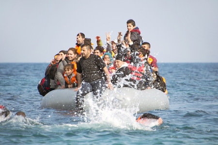 LESVOS, GREECE February 02, 2016: Refugees arriving in Greece in dinghy boat from Turkey. These Syrian, Afghanistan and African refugees land their boat near Mytilene Lesvos.のeditorial素材