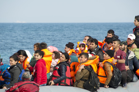 LESVOS, GREECE February 02, 2016: Refugees arriving in Greece in dinghy boat from Turkey. These Syrian, Afghanistan and African refugees land their boat near Mytilene Lesvos.のeditorial素材