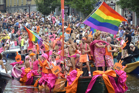 Amsterdam, Netherlands - August 2, 2014: participants in the annual event for the protection of human rights and civil equality - Gay Pride Parade on the Prinsengracht, Amsterdamのeditorial素材