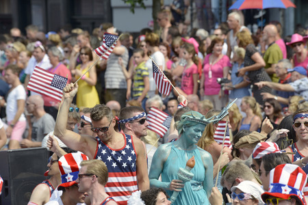 Amsterdam, Netherlands - August 2, 2014: participants in the annual event for the protection of human rights and civil equality - Gay Pride Parade on the Prinsengracht, Amsterdamのeditorial素材